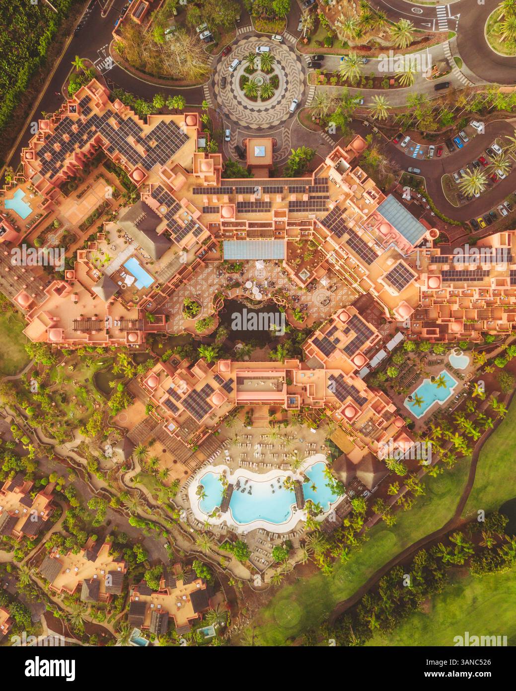 Aerial view of abama garden resort with luxurious swimming pool and tropical greenery, Guia de Isora, Spain. Stock Photo