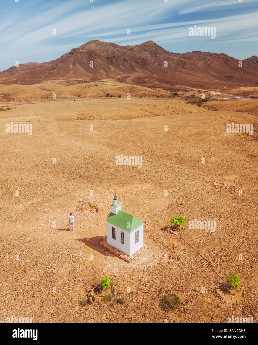 Aerial view of Ermita de Violante Church in desert mountain landscape ...