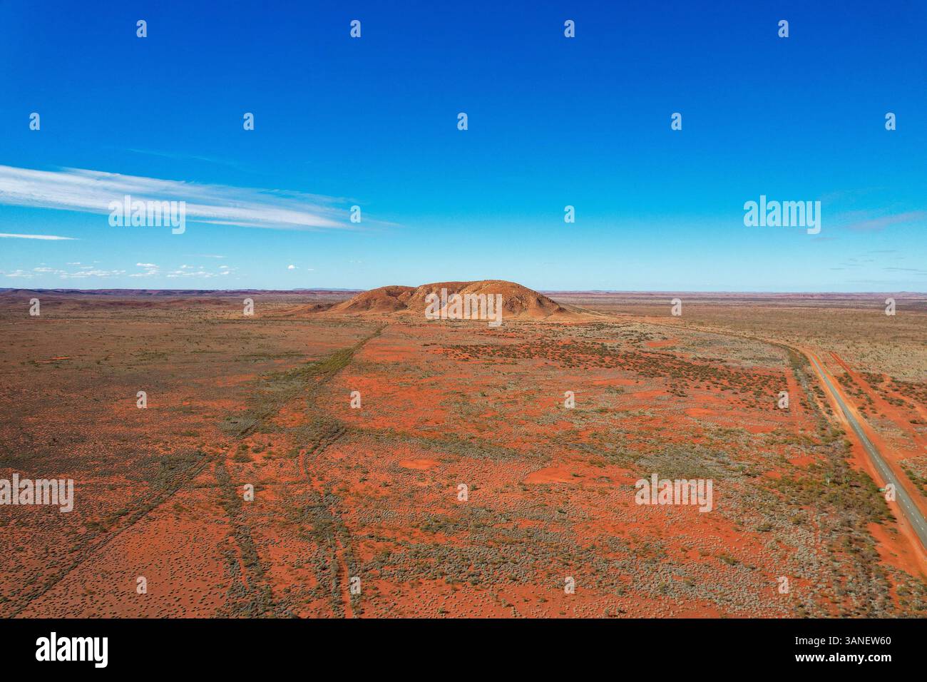 Aerial view of expansive arid landscape with Mount Murray and Parry Range along the N W Coastal Highway, Nanutarra, Western Australia. Stock Photo