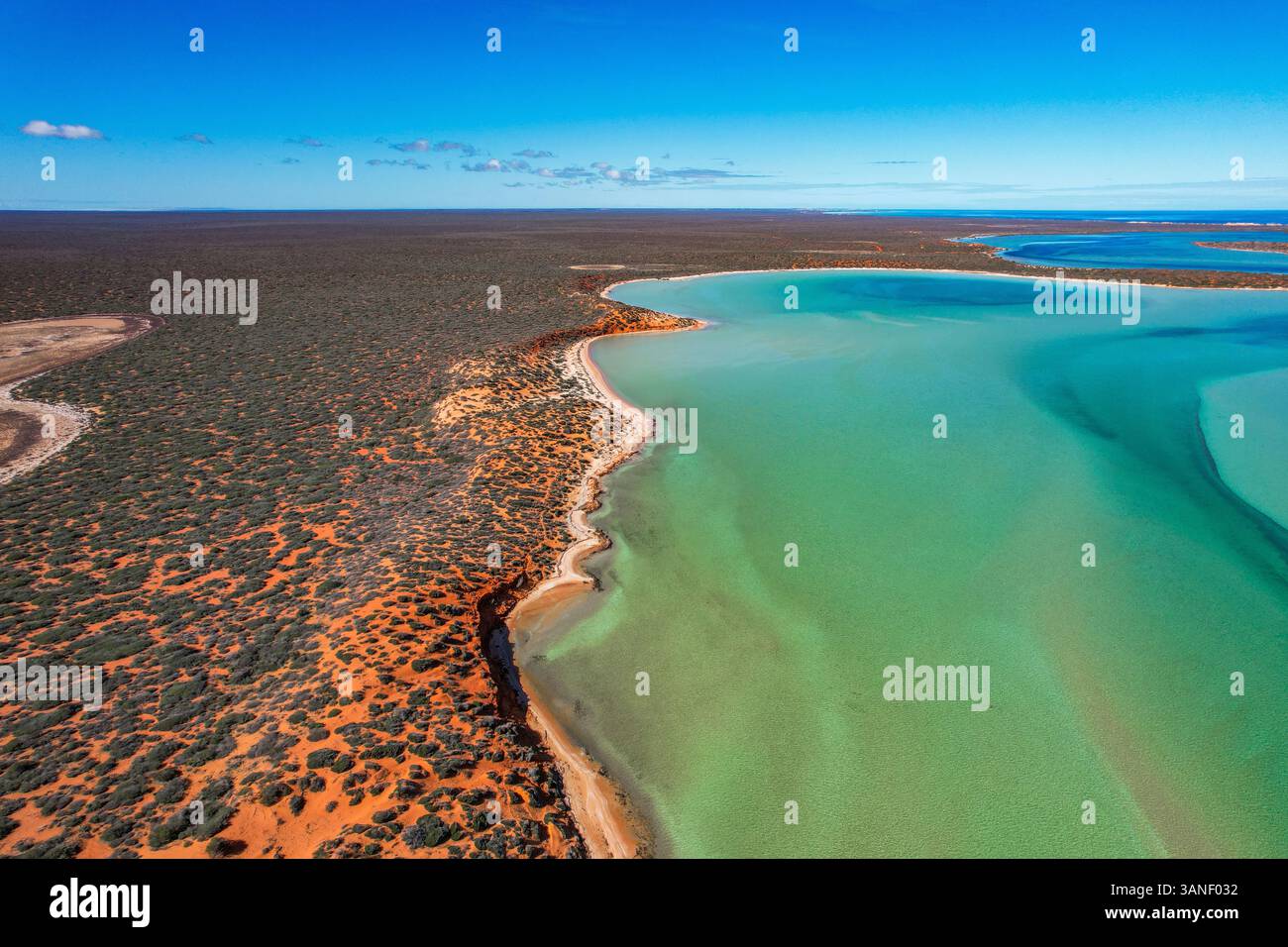 Aerial view of big lagoon with turquoise water and pristine coastline ...