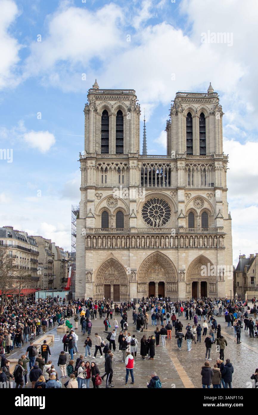 Paris, France - February 22nd 2025 : Notre-Dame de Paris and tourists ...