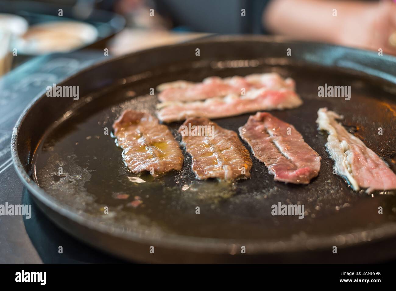 Grilled raw meat beef and pork (barbeque, bbq) a food cooking on wagyu ...