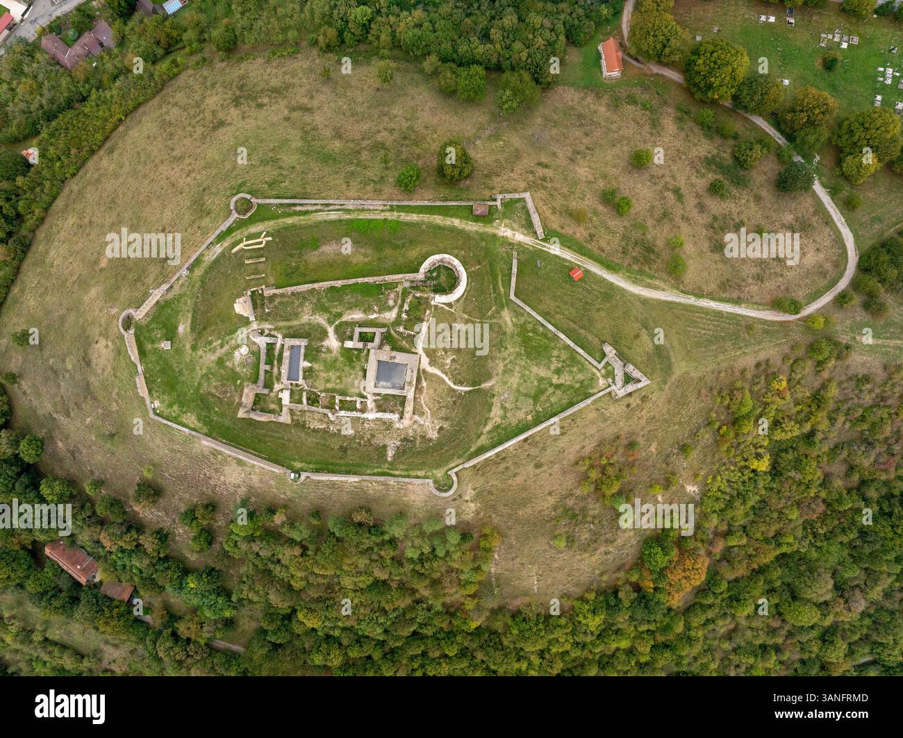 Aerial view of the historic ruins of Branc castle surrounded by lush ...