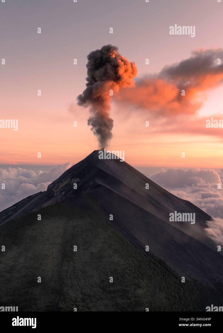 Aerial view of erupting Volcano Fuego with dramatic smoke and ash ...