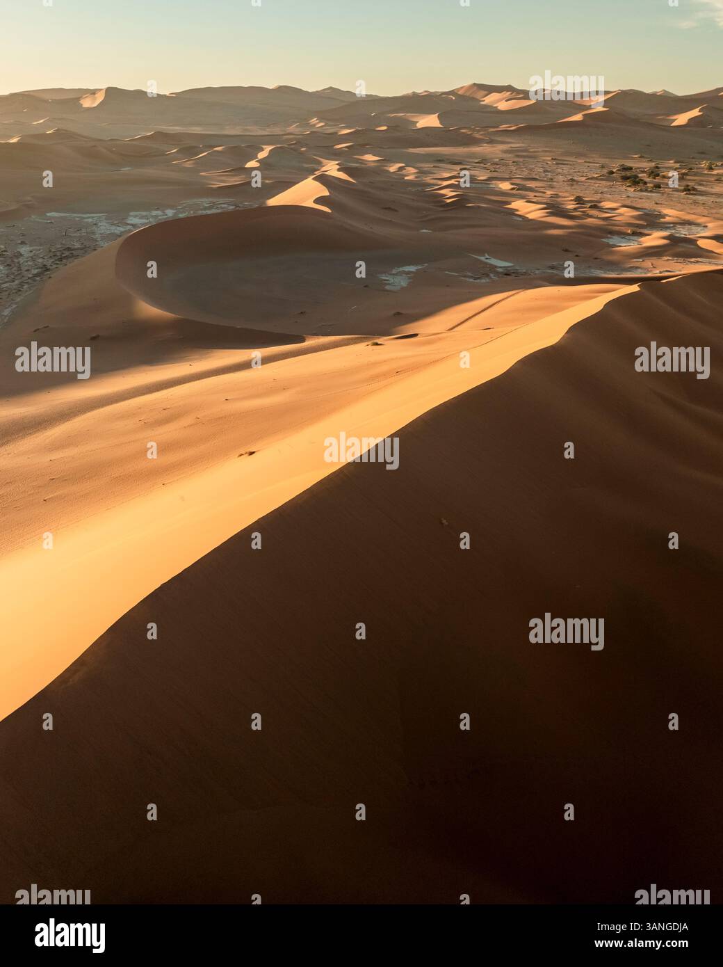 Aerial view of sandy desert landscape with sand dunes in Sossusvlei ...