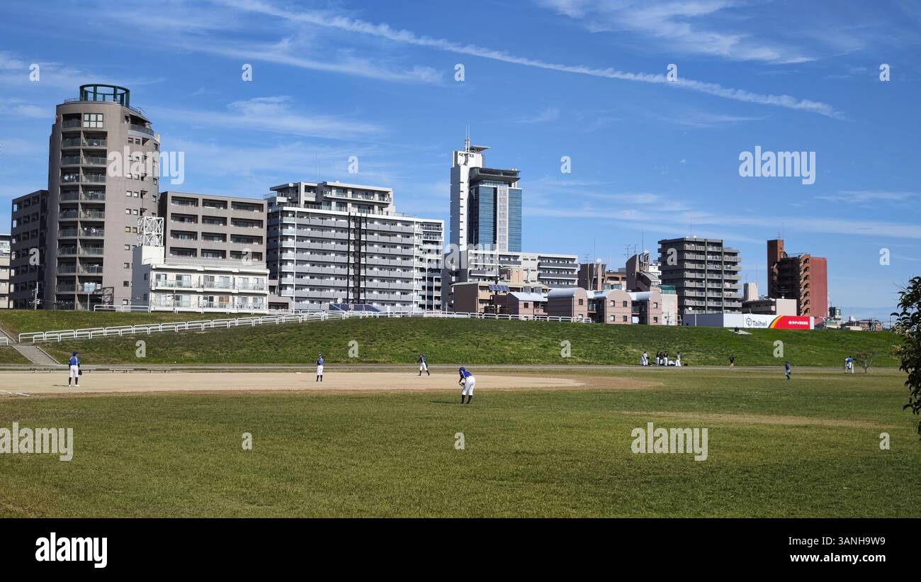 Keyence Japan Keyence headquarters building exterior and outdoor baseball field near ...