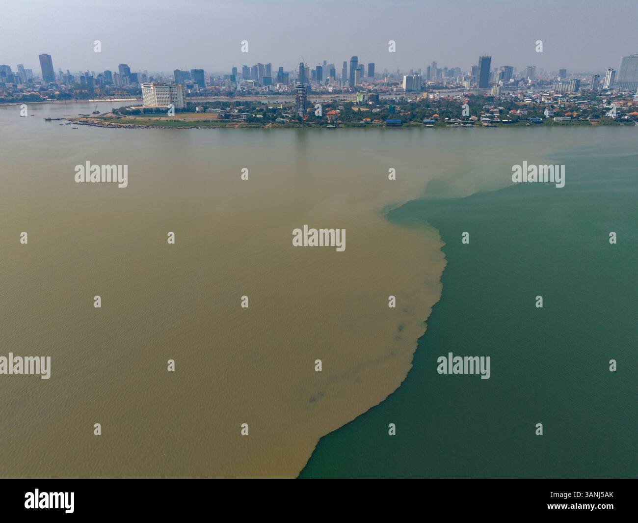 Aerial view of the merging rivers of Mekong and Tonle Sap with a ...