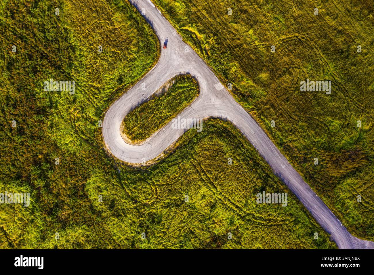 Aerial view of a road in a green field, Palm Bay, Florida, United States. Stock Photo