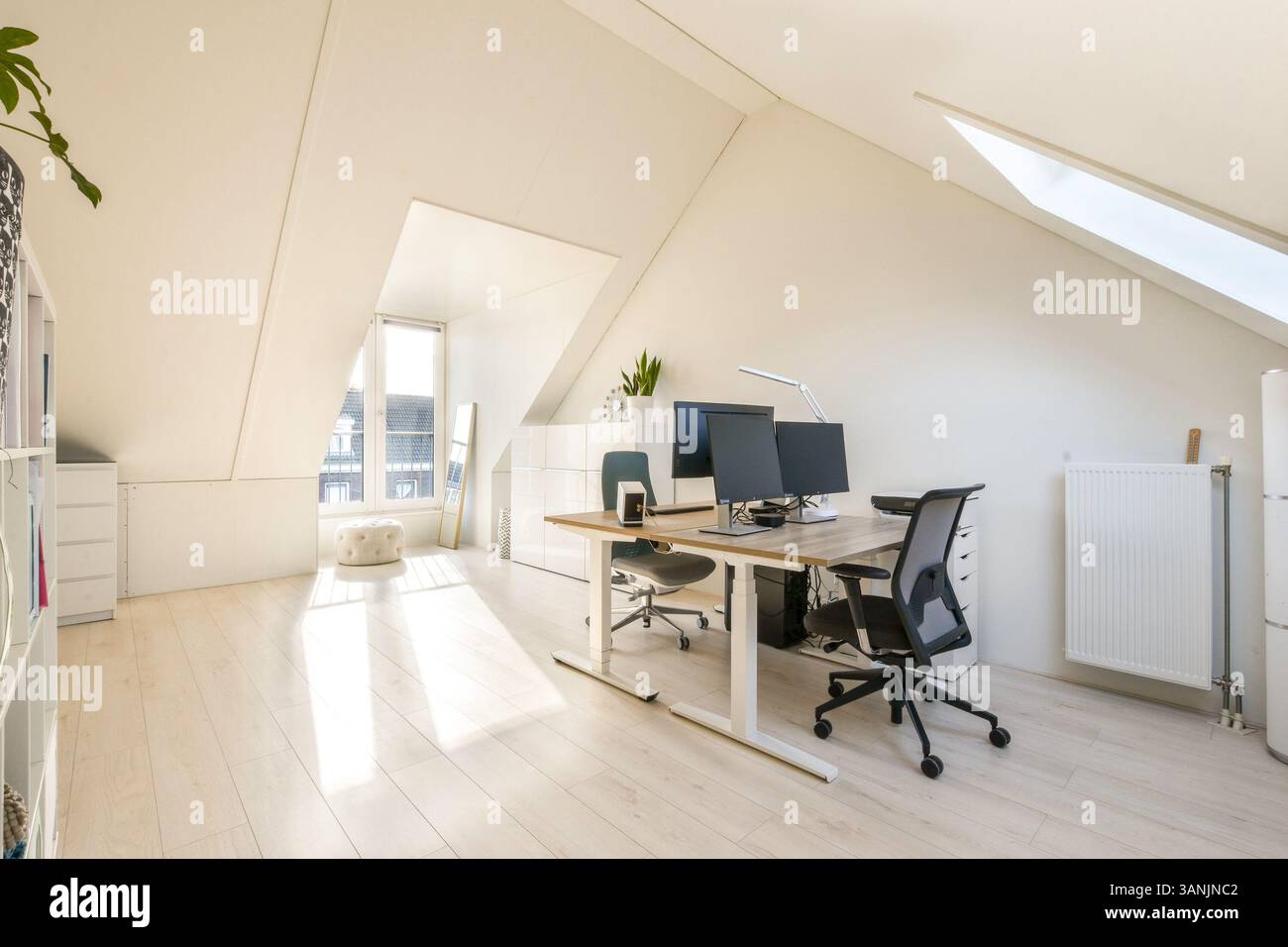 Bright and airy modern office space featuring sleek furniture, dual ...