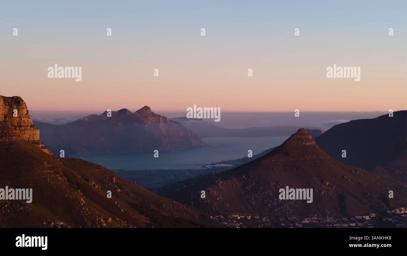 aerial-view-of-lion-s-head-surrounded-by-fog-with-a-coastal-landscape