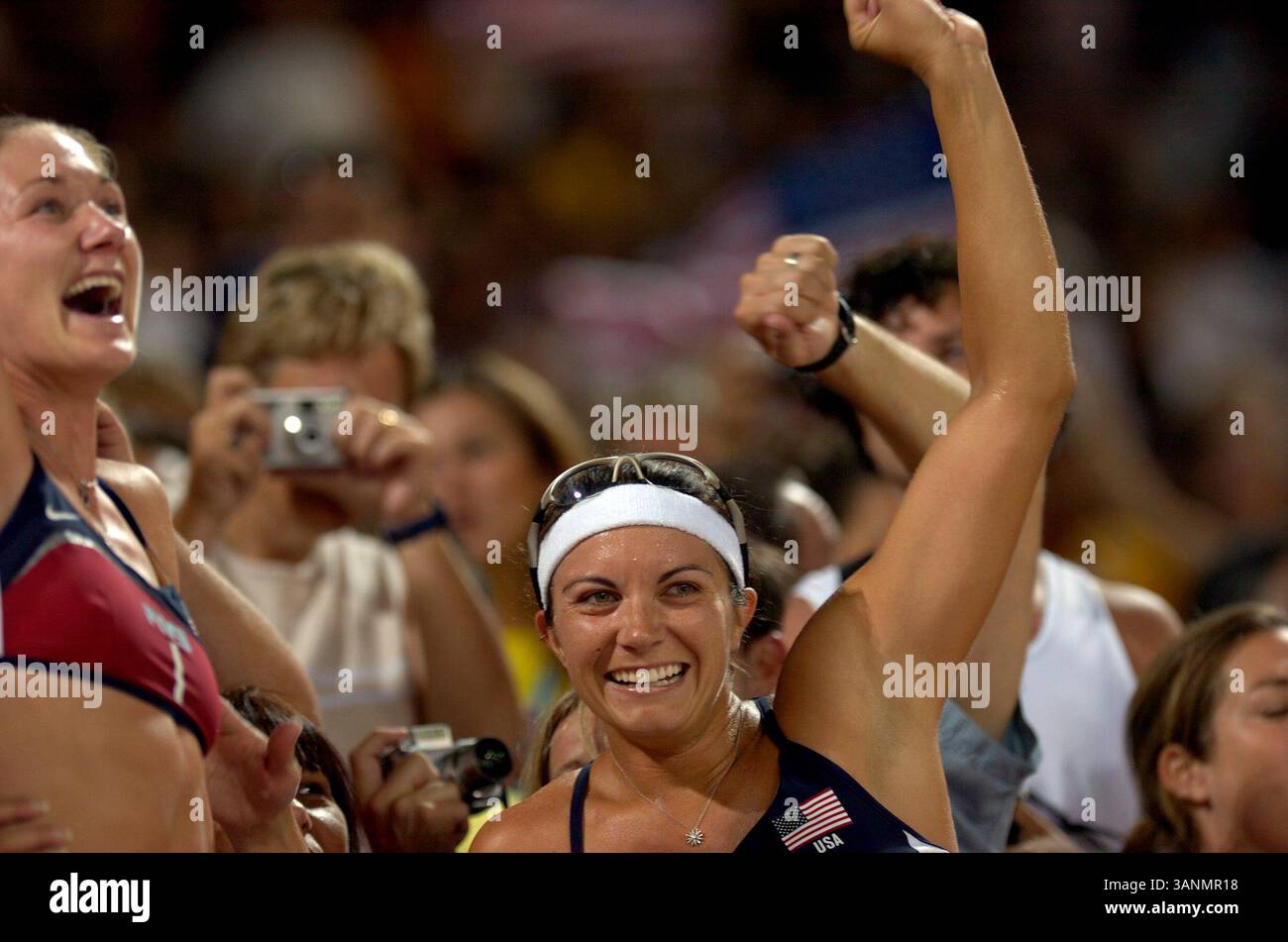 Shelda Aug 24, 2004; Athens, GREECE; MISTY MAY (USA) celebrates their victory ...