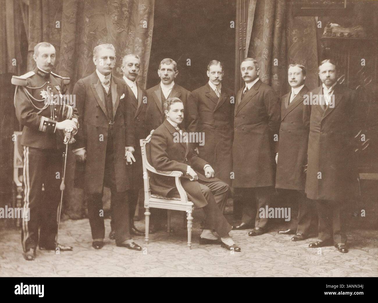 This photograph shows King Manuel II of Portugal with his peers during his 1909 visit to Paris. The image reflects early 20th-century royal representation and the historical context of the Portuguese monarchy. Stock Photo