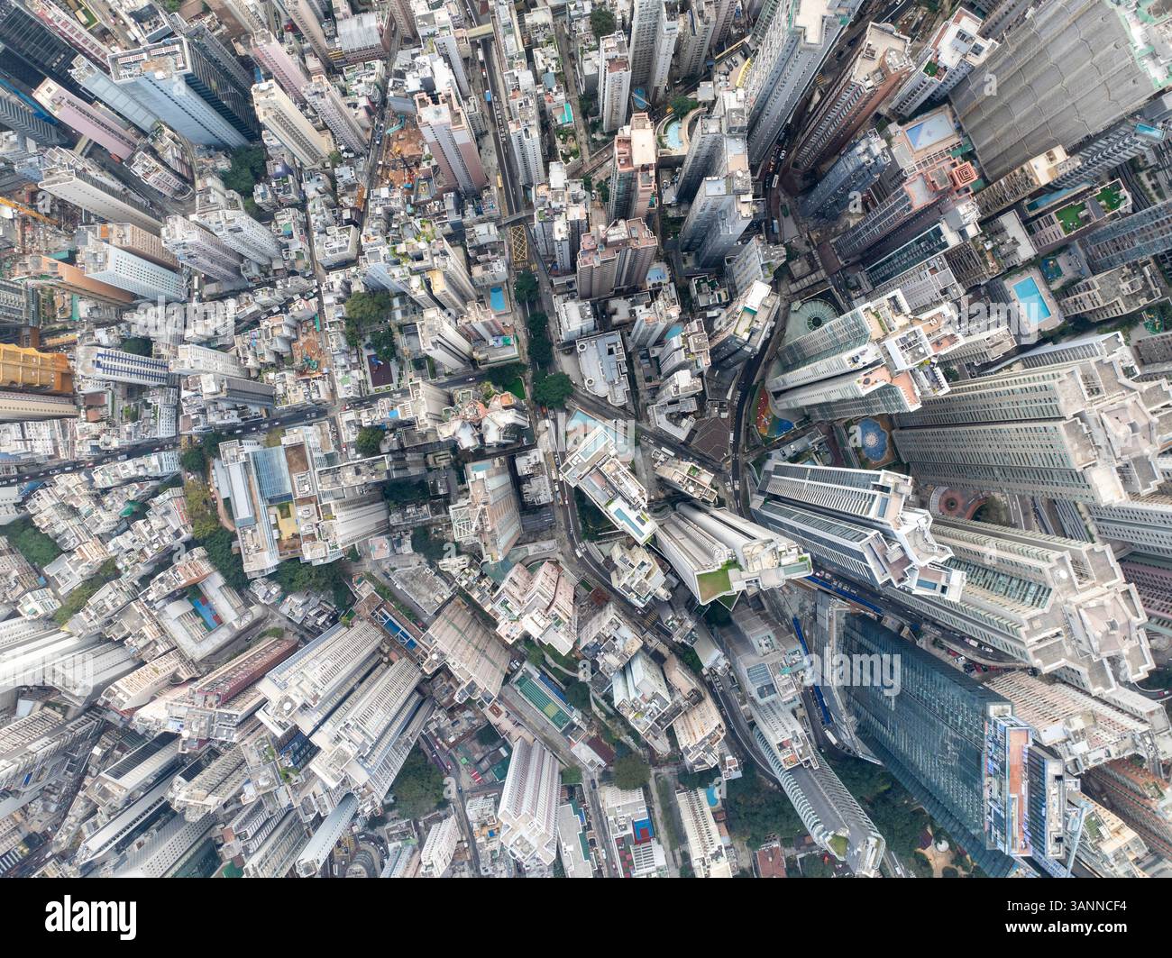 Aerial view of a bustling urban landscape with dense skyscrapers and ...