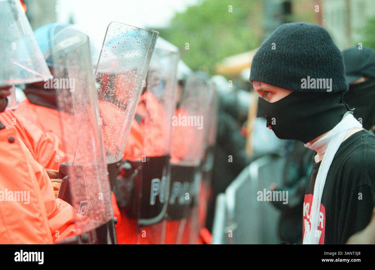 April 16, 2000 - Washington, DC, USA - A demonstrator stares down a ...