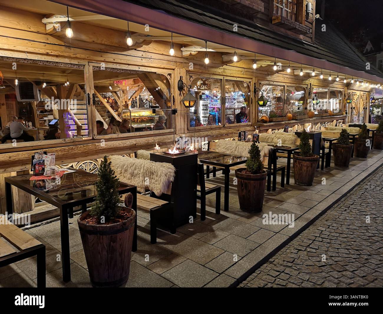 Owczarnia Restaurant in Zakopane is a cozy, highlander-style eatery with beautiful wooden architecture of Zakopane, southern Poland - Smartphone Captured Stock Image