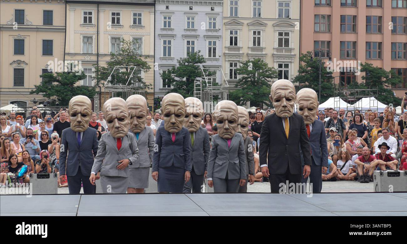 Theatre KTO perform 'Peregrinus' on the main old town square in Krakow Poland. - Smartphone Captured Stock Image