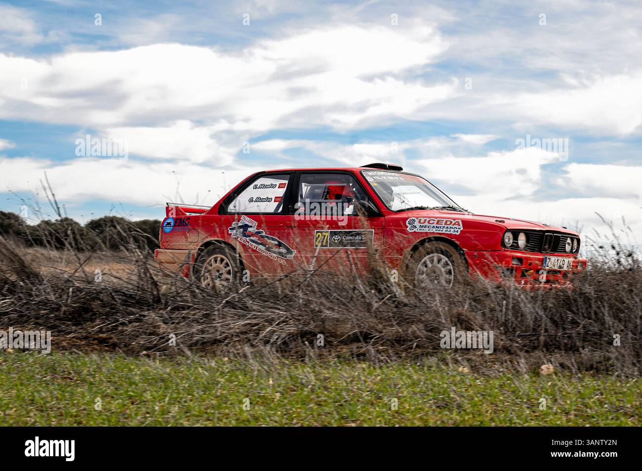 Madrid, Spain; 02-15-2025: A BMW 325i E30 series rally car driving on a ...