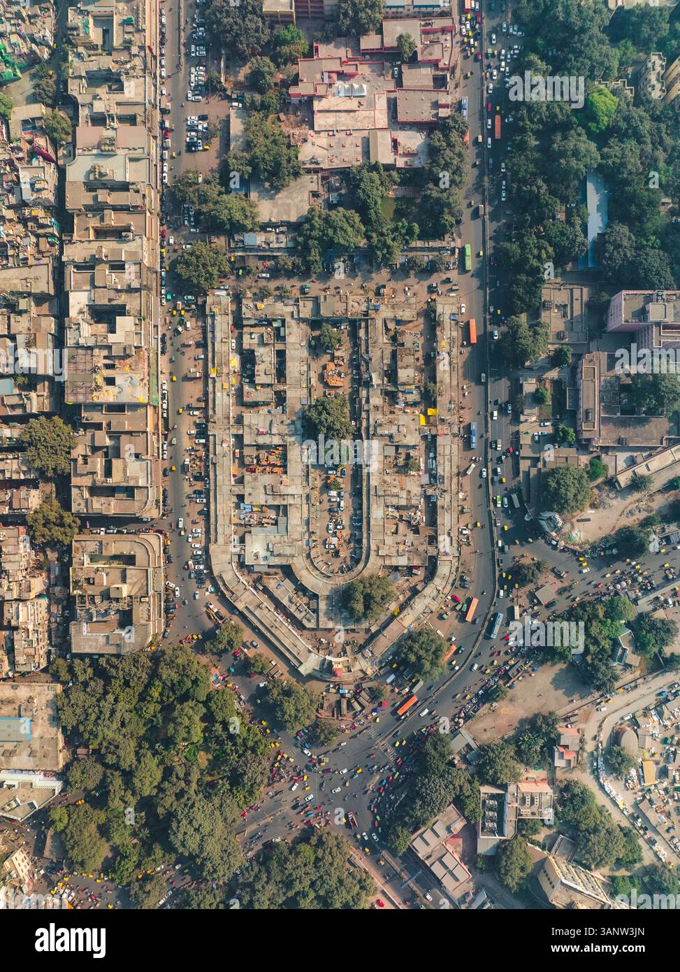Aerial view of busy urban intersection with dense buildings and roads ...