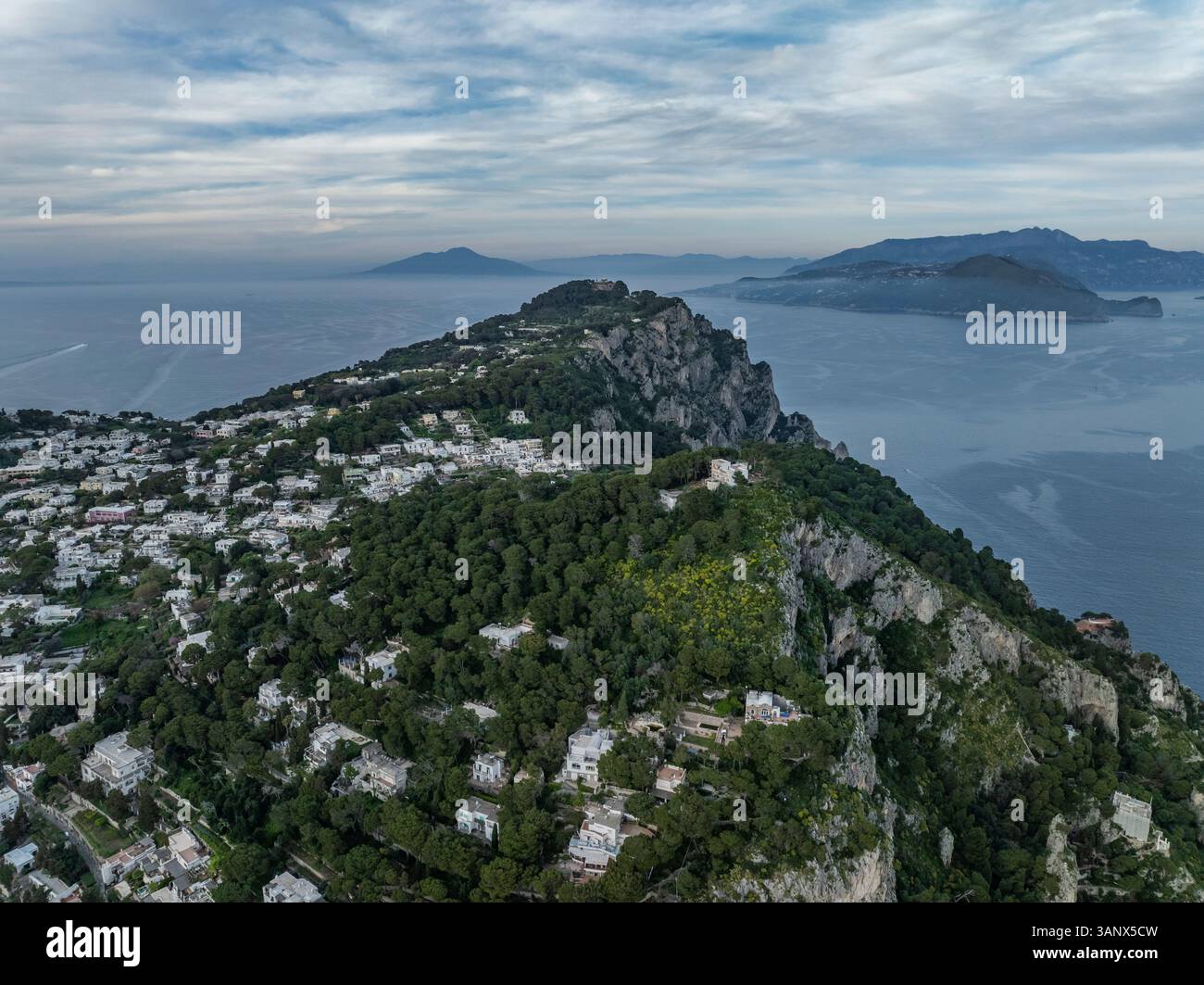 Aerial view of Capri Island with Amalfi coast in background, Campania Region, Italy. Stock Photo