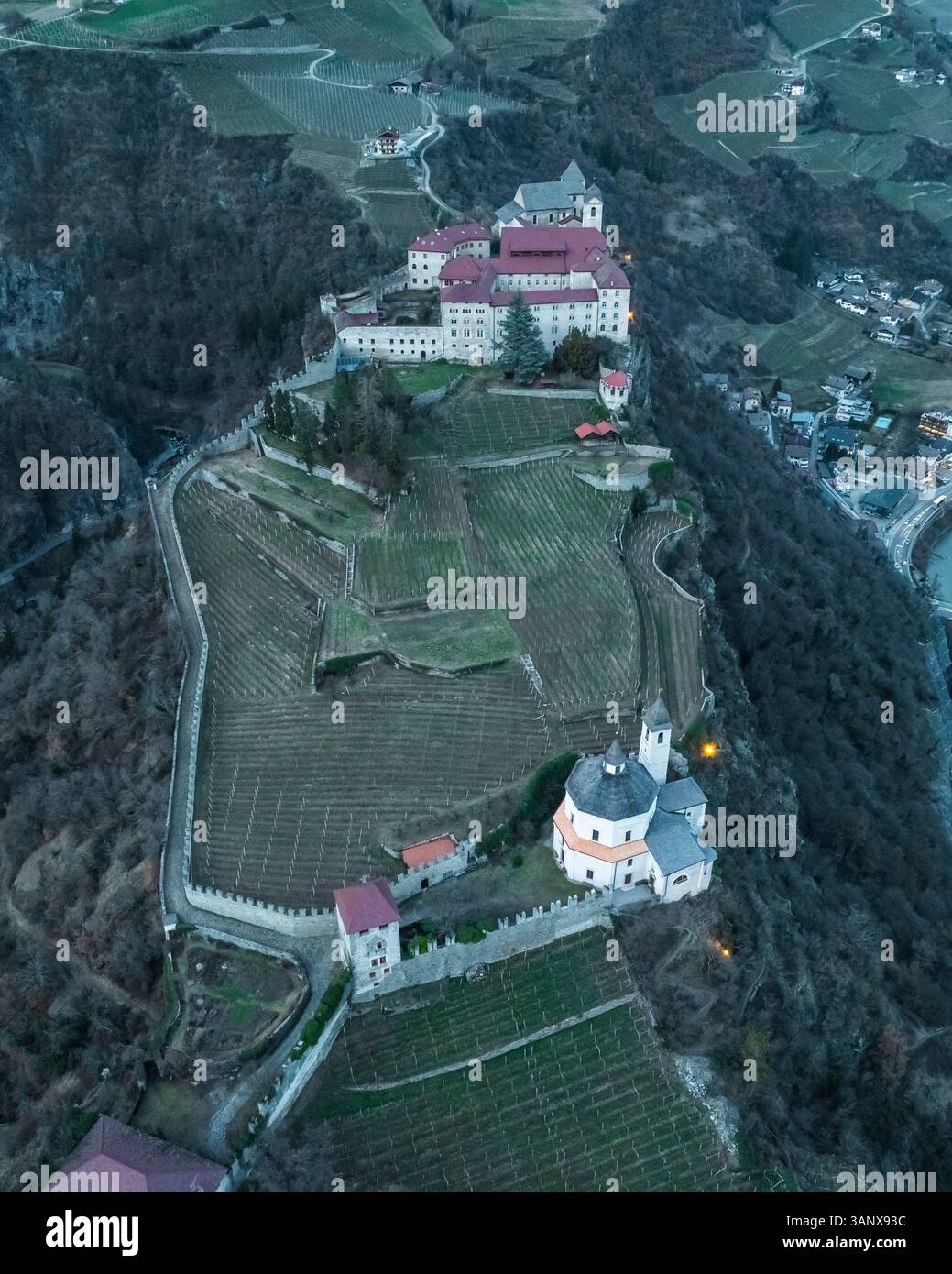 Aerial view of Chiusa town with Sabiona Monastery, Klausen, South Tyrol, Italy. Stock Photo