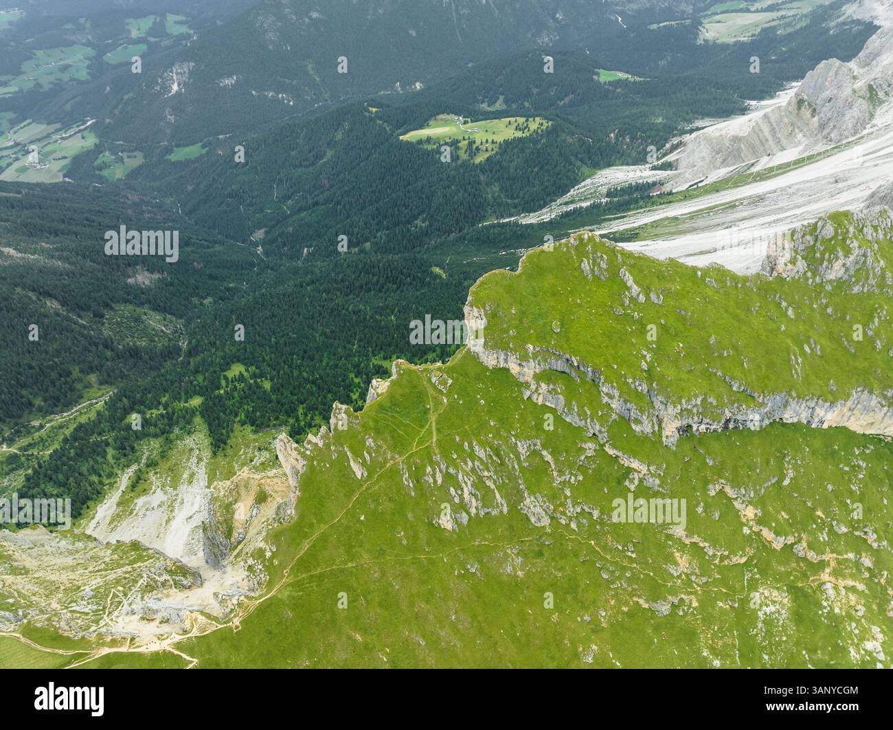 Aerial view of Seceda mountain ridge on the Dolomites in the Odle ...