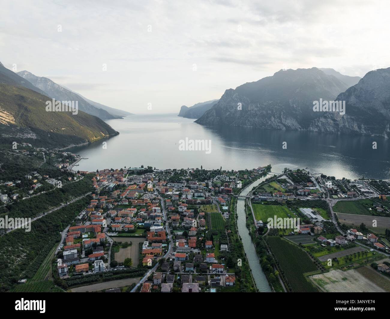 Aerial View Of Torbole A Small Town Along The Garda Lake With Sarca Aerial View Of Torbole A Small Town Along The Garda Lake With Sarca