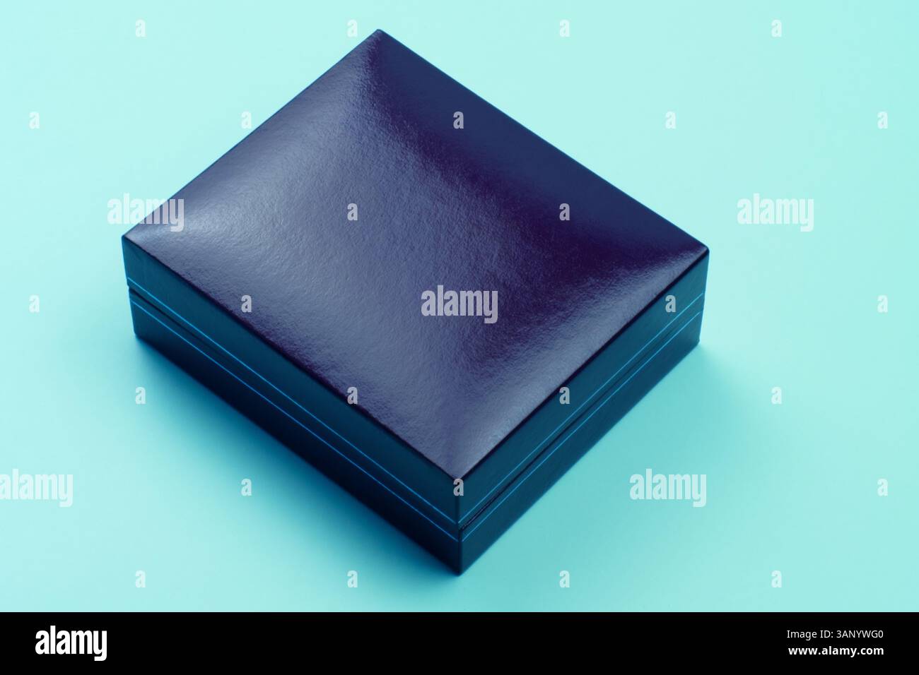 gift box on clean surface with soft shadows seen from above flat lay style for holiday celebration or birthday present Stock Photo