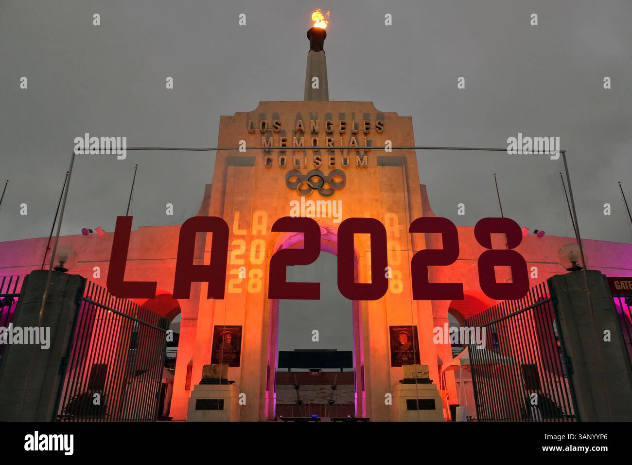 Coliseum Cauldron FILE - An LA 2028 sign is seen in front of the Olympic cauldron at the ...