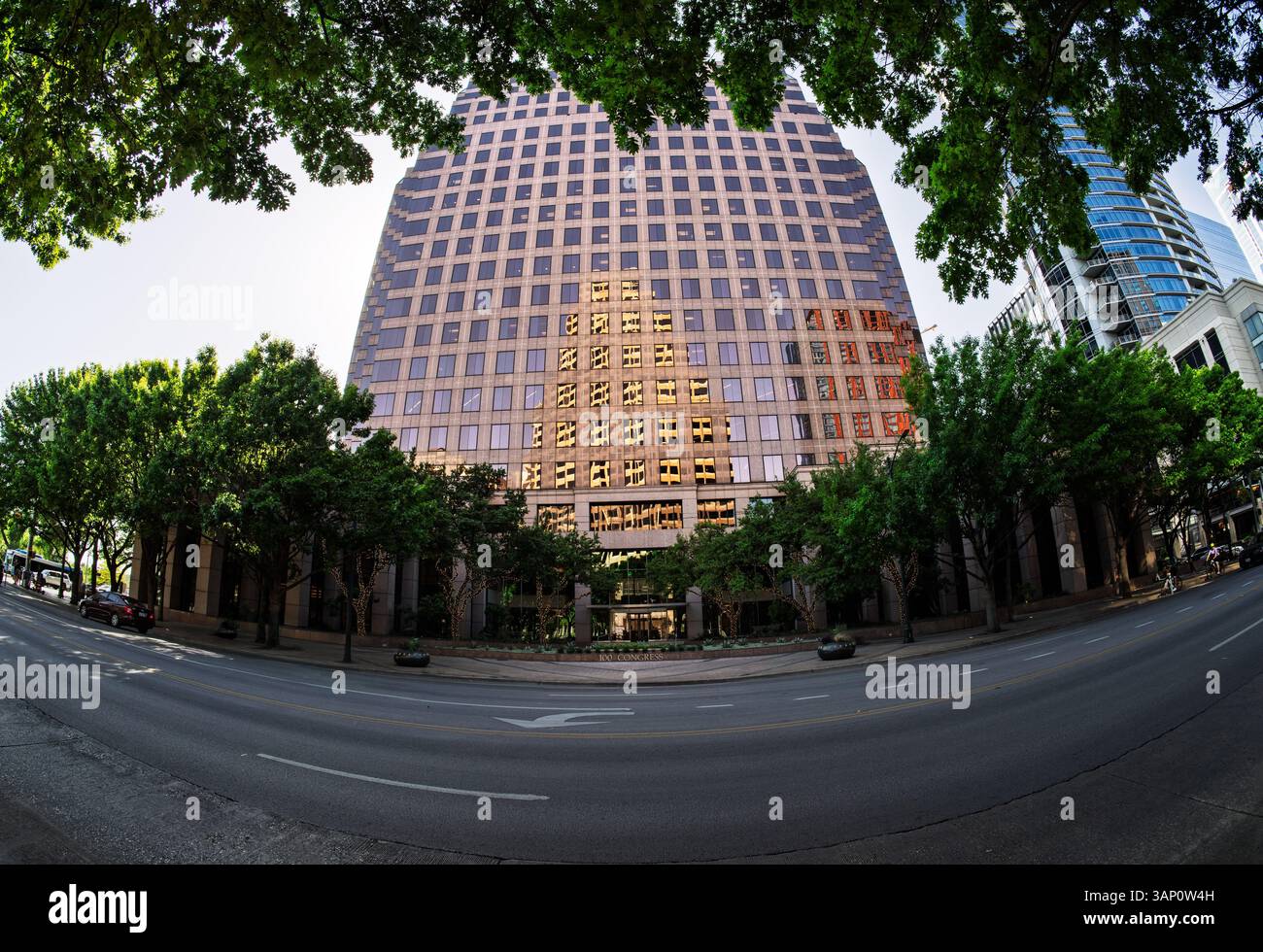 Austin, TX - 10 April 2025: Fisheye lens view of 100 Congress building ...