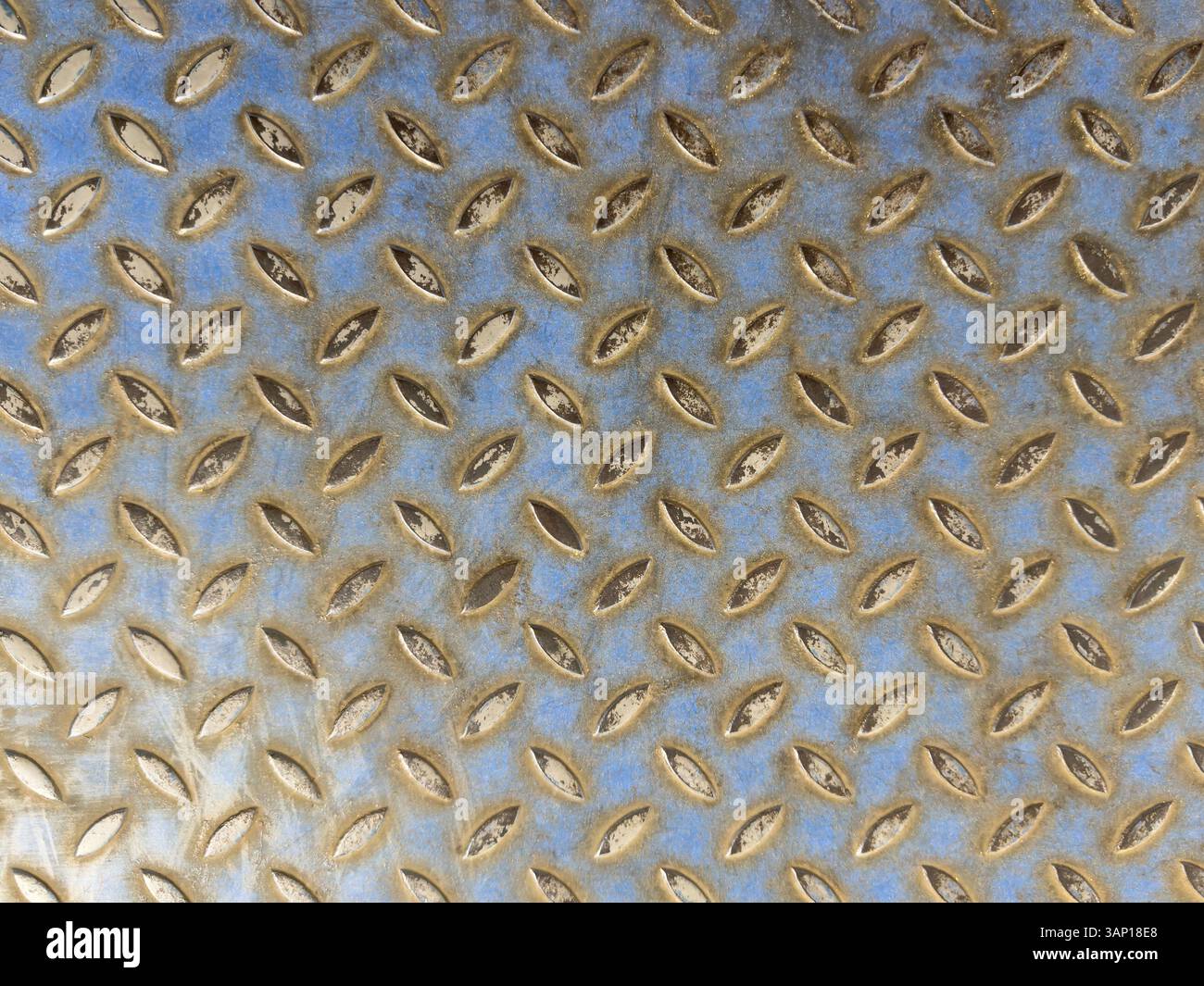 Corroded metal pattern with relief rombus close up view Stock Photo