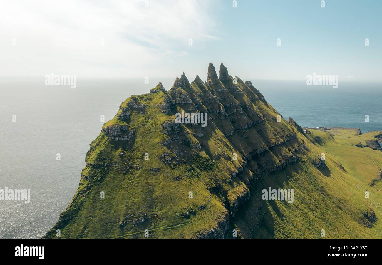 Aerial View Of Tindholmur Cliff And Sea With Majestic Mountains Bour Aerial View Of Tindholmur Cliff And Sea With Majestic Mountains Bour