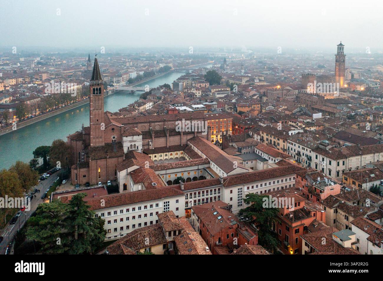 Aerial view of basilica di santa anastasia and adige river amidst the ...