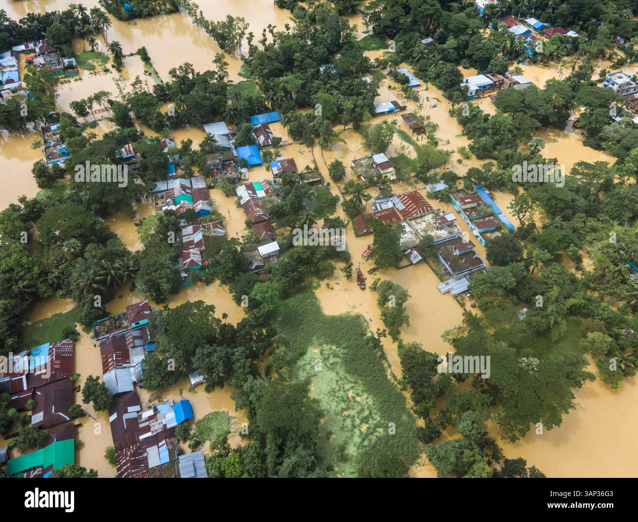 Aerial view of flooded highway and submerged village with waterlogged ...