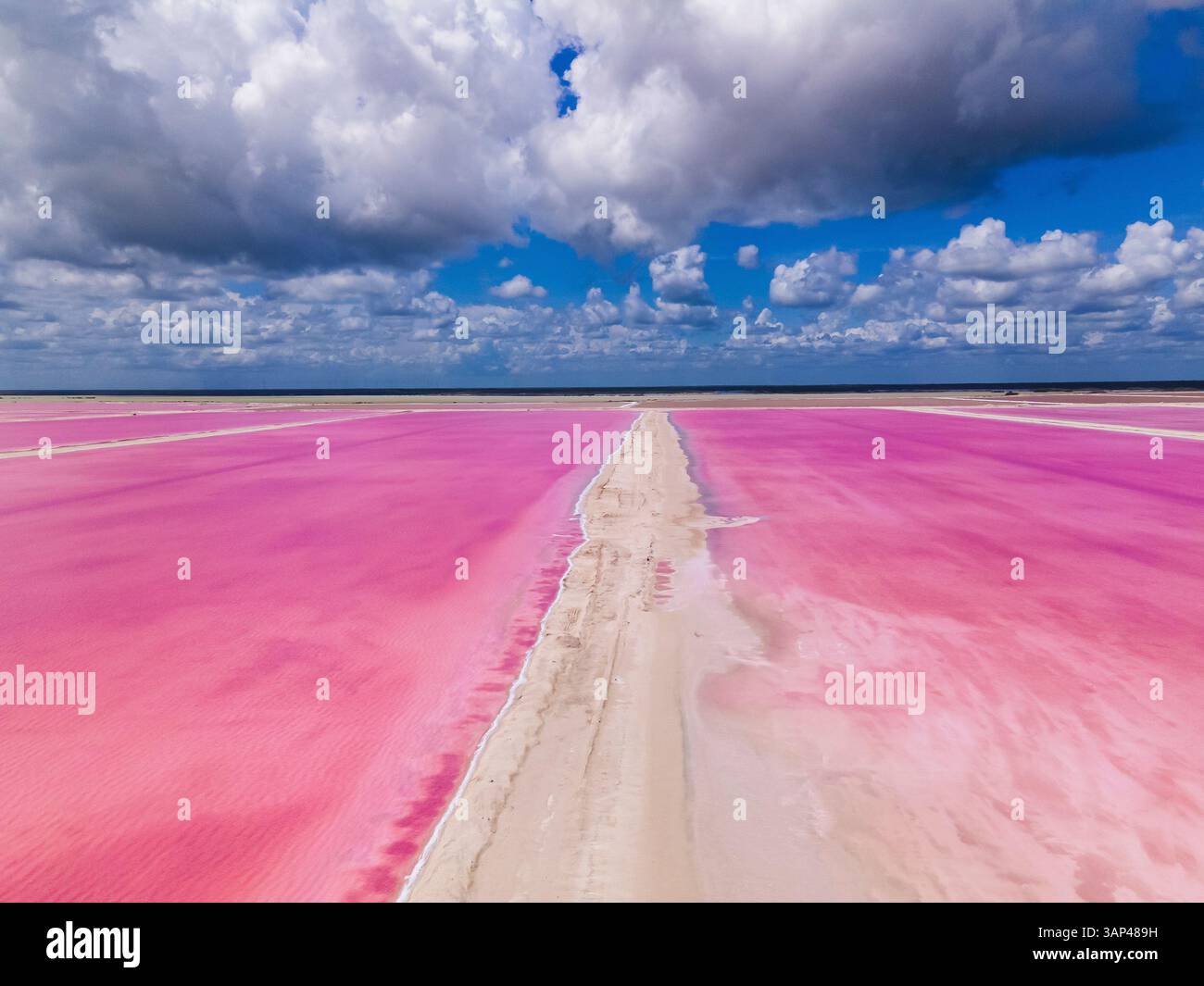 aerial-view-of-pink-salt-lakes-along-the-coast-at-ria-largatos-natural