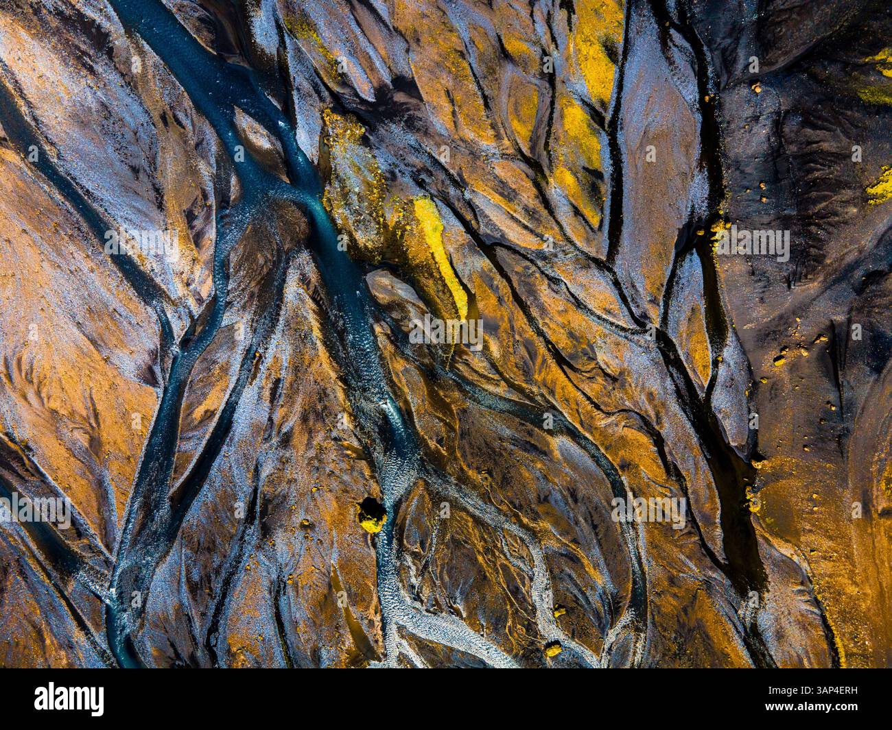 Aerial view of colorful and majestic patterns and textures in the river ...