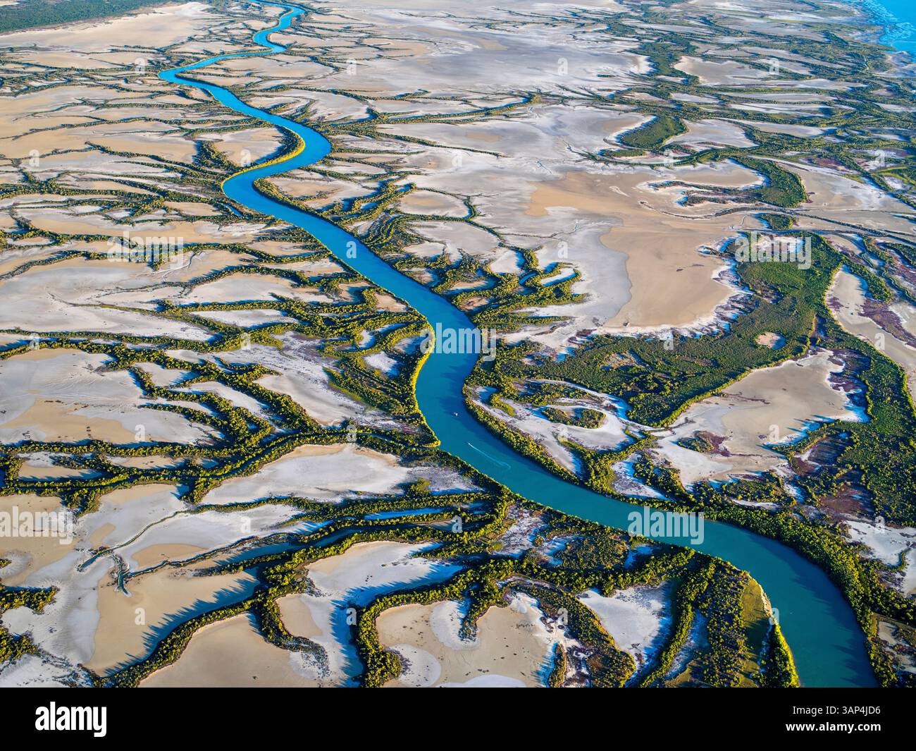 Aerial view of winding river and coastal wetland in Accident Inlet ...