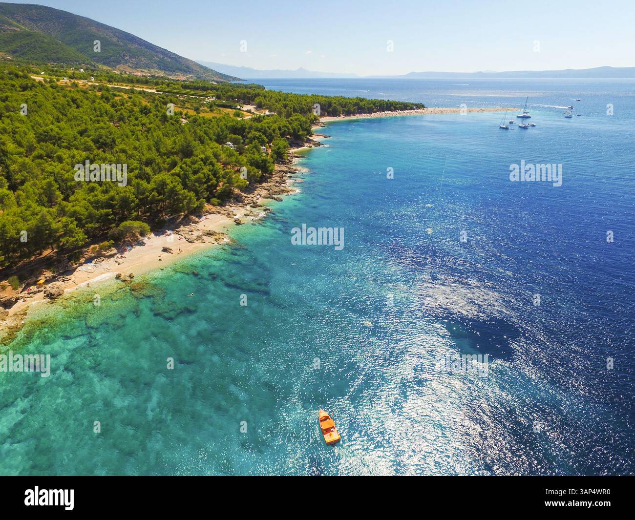 Aerial View Of Zlatni Rat Beach In Bol Island Brac Croatia Stock aerial-view-of-zlatni-rat-beach-in-bol-island-brac-croatia-stock