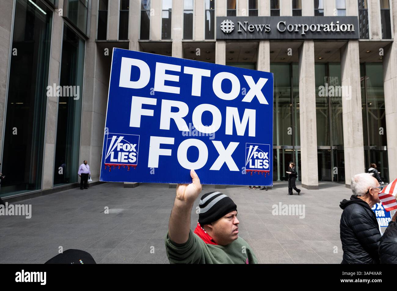 New York City, United States. 15th Apr, 2025. Person with a sign saying