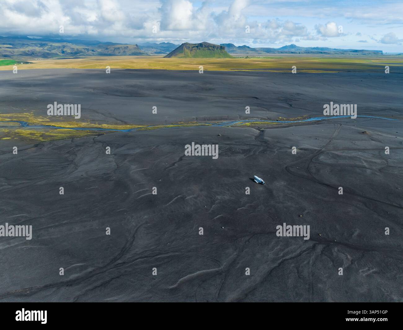 Aerial view of glacial outwash plain Solheimasandur with plane wreck of ...