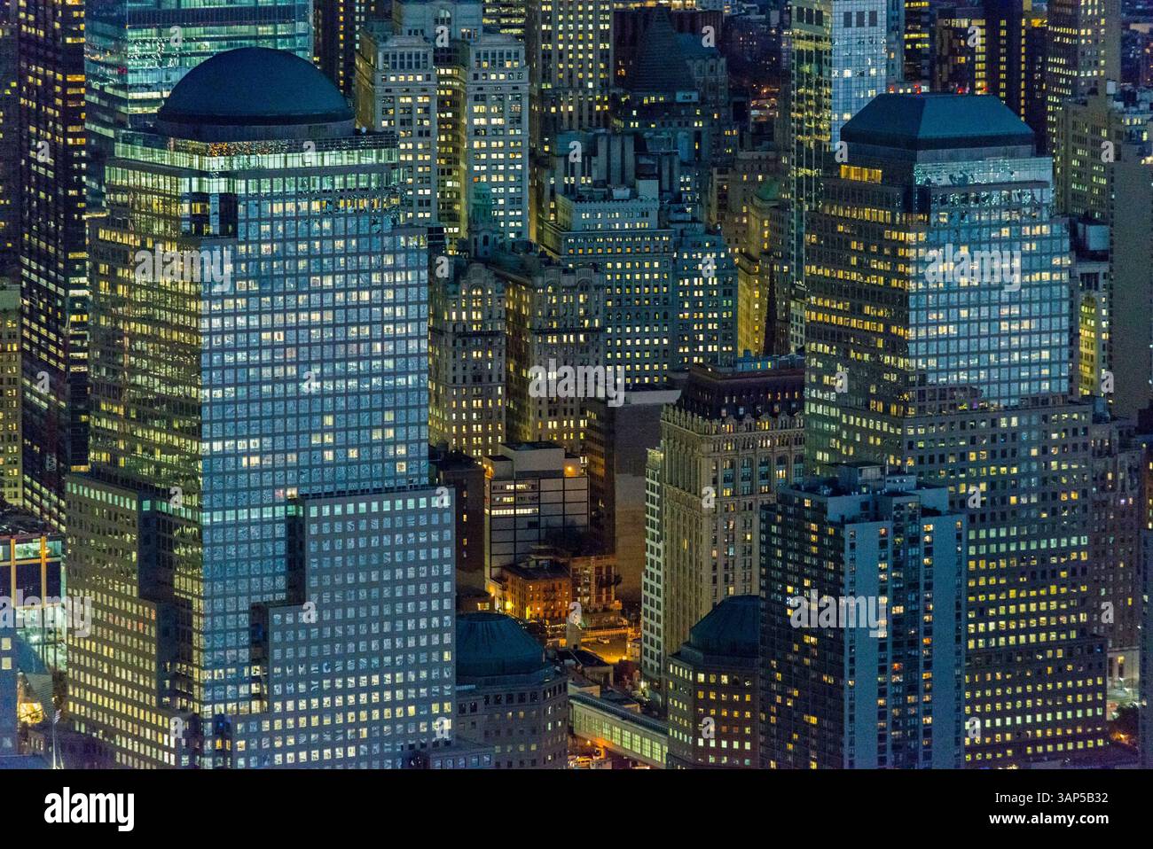 Aerial view of vibrant cityscape with illuminated skyscrapers and ...