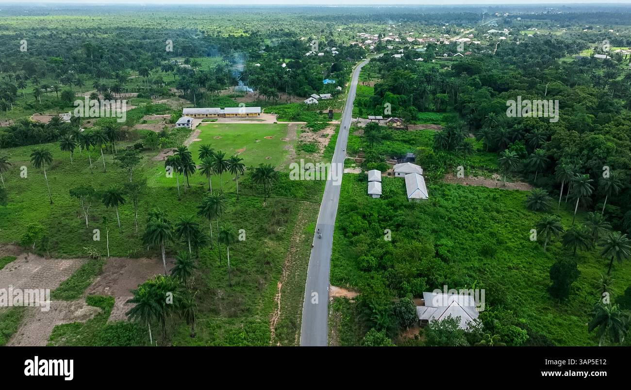 Aerial view of lush countryside with Ahoada Main Road, Ahoada, Rivers ...
