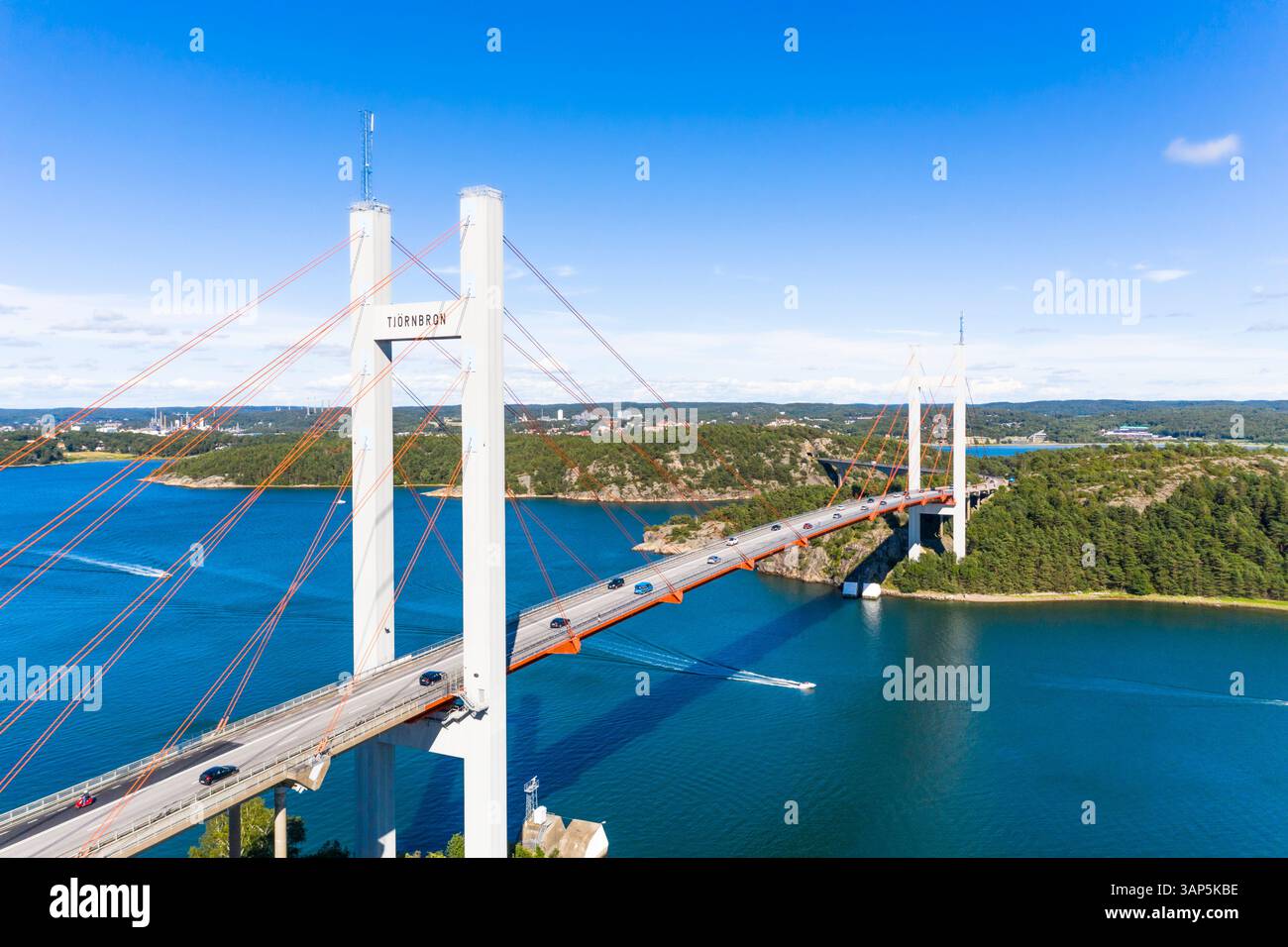 Panoramic aerial view of Tjörnbron suspension bridge with passing cars ...