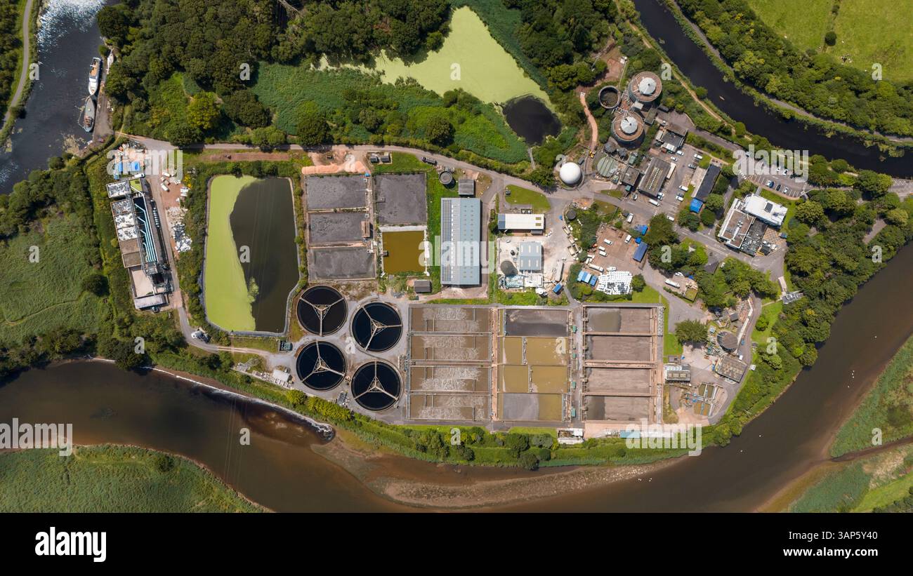 Aerial view of industrial water treatment plant with tanks and ponds ...