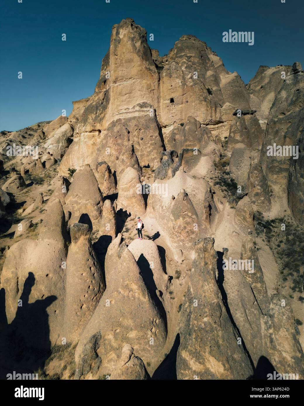 Aerial view of tall, cone-shaped rock formations clustered in Monks ...