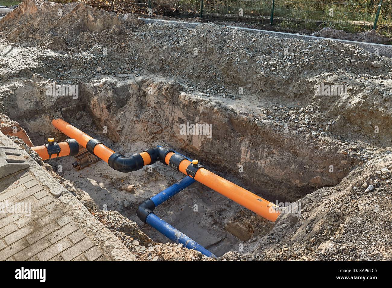 Construction site water utility pipes Stock Photo - Alamy