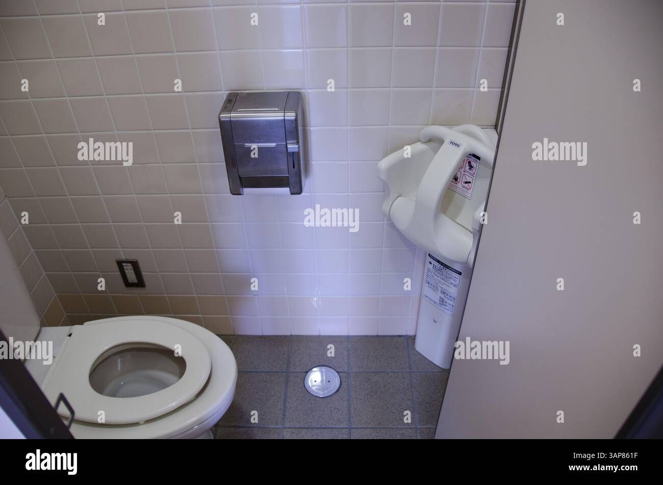 Public bathroom with child seats as used in Japan, Osaka, Japan, Asia ...