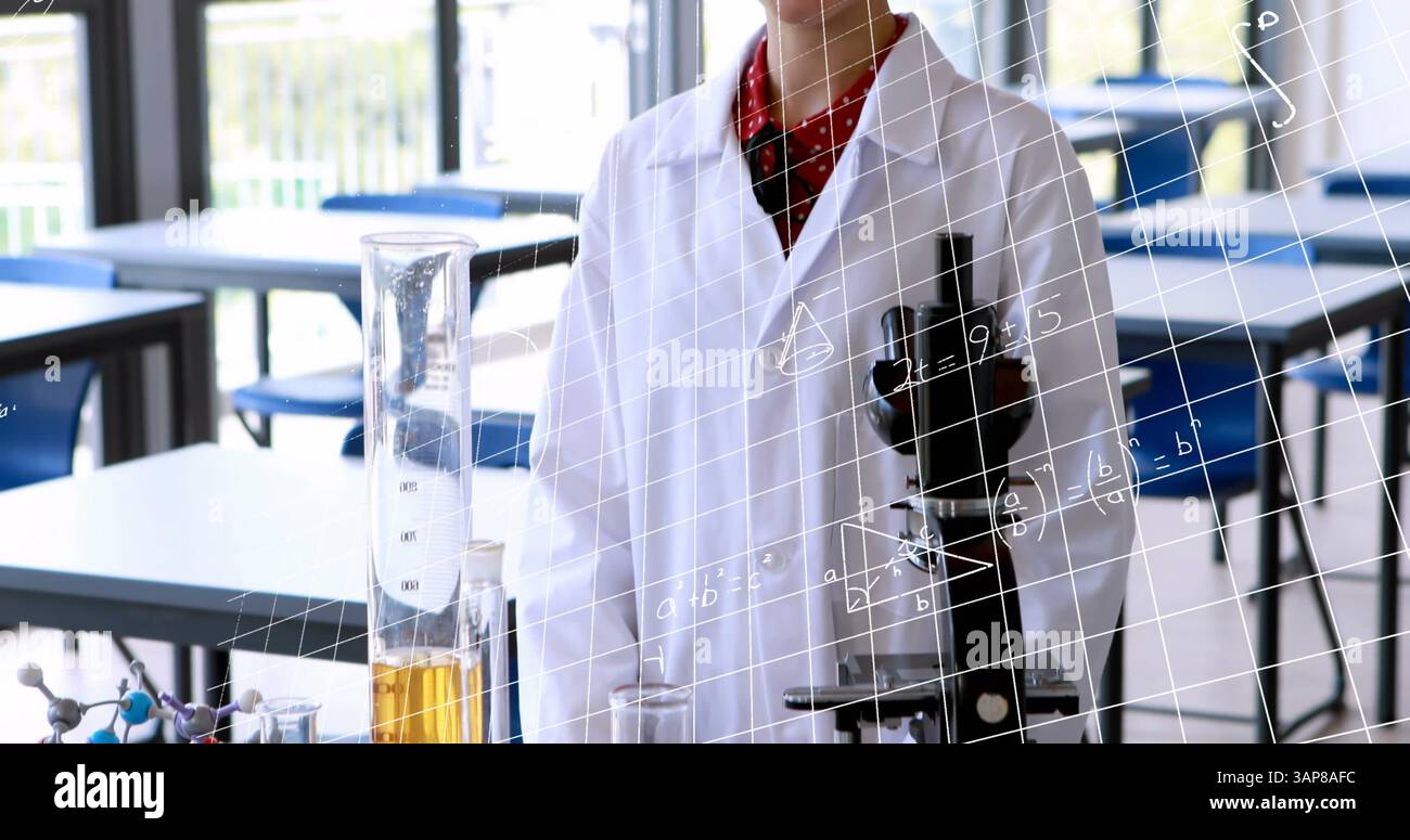 Image of mathematical formulae over smiling student Stock Photo