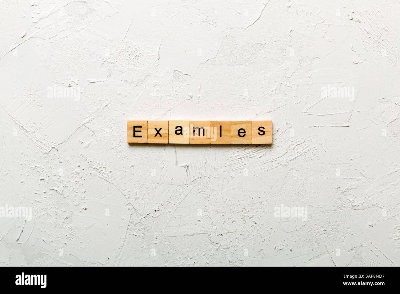 examples word written on wood block. examples text on table, concept. Stock Photo