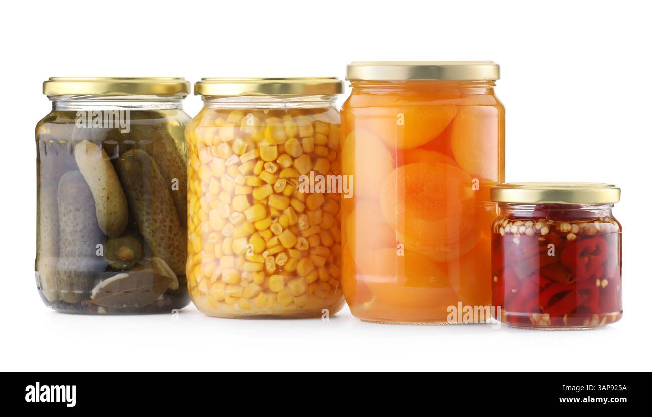 Many jars with different pickled products isolated on white Stock Photo