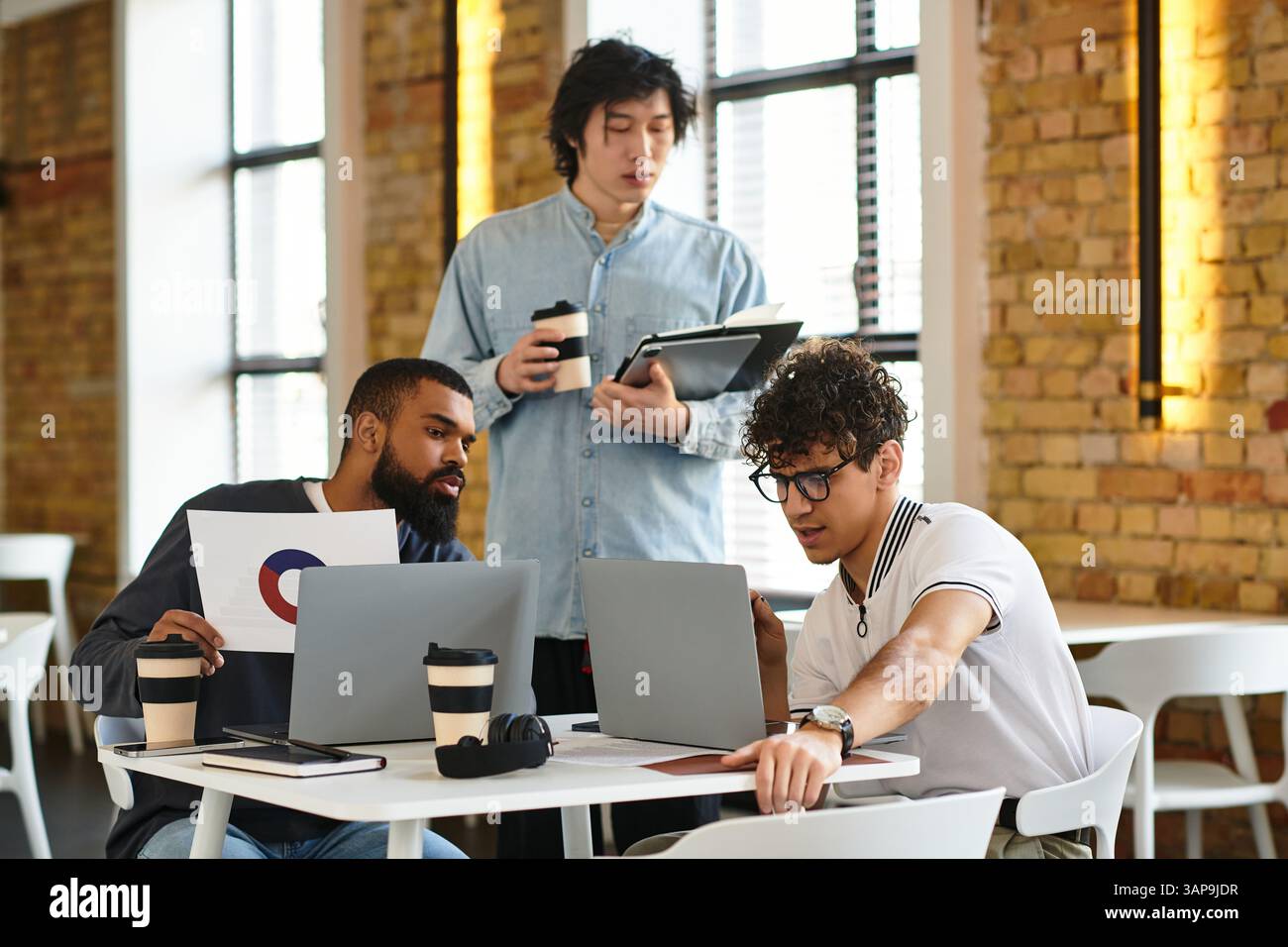 A diverse group of colleagues engages in a creative brainstorming ...